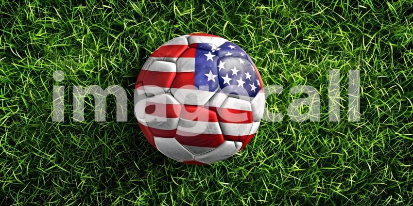 Football with the national flag of united states of America on grass background - Ai generated