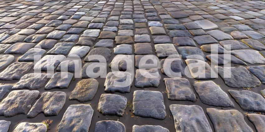 Cobblestone road surface texture background - Ai Generated