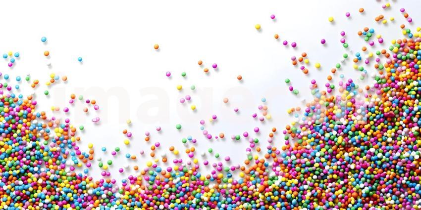 Colorful sprinkles with copy space on white background - Ai Generated