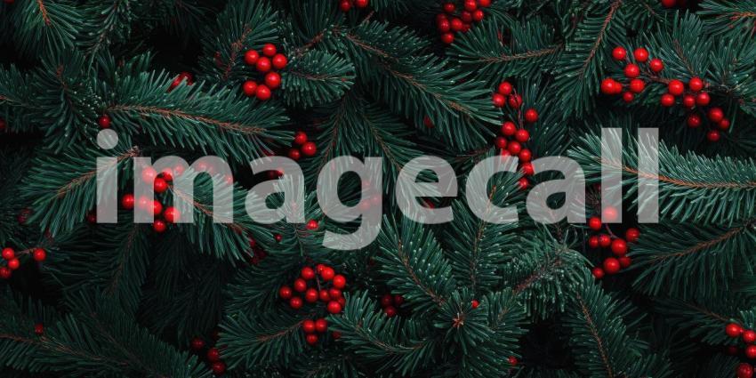 A vibrant arrangement of lush green foliage adorned with clusters of bright red berries, creating a festive and inviting winter scene