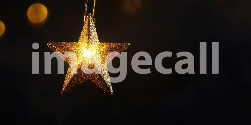 A Celestial Glow: A Luminous Star Shines Bright Against a Smoky Night Sky