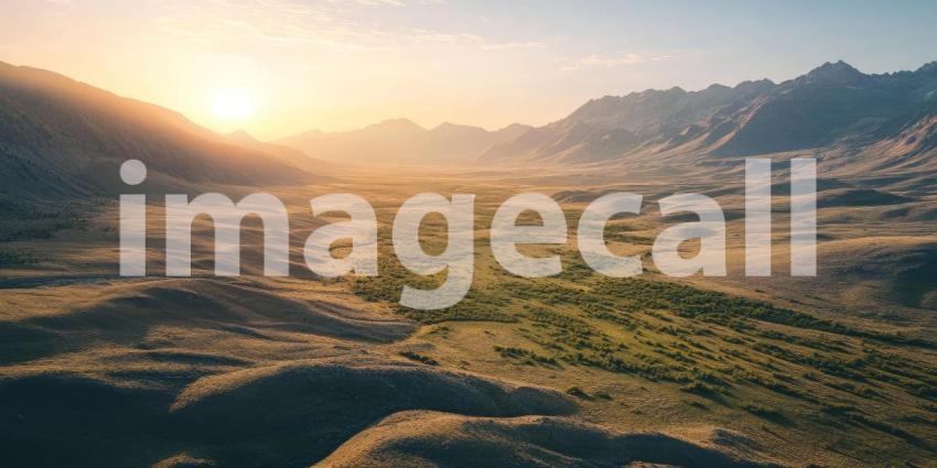 Golden Hour Panorama of Rolling Hills and Mountain Ranges Bathed in Warm Sunlight