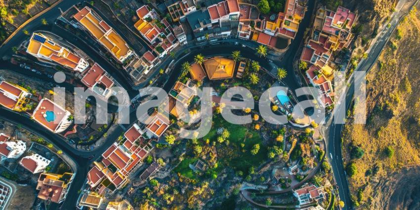 Mountainside Village: A Verdant Oasis Nestled Among Terraced Vineyards and Rugged Cliffs