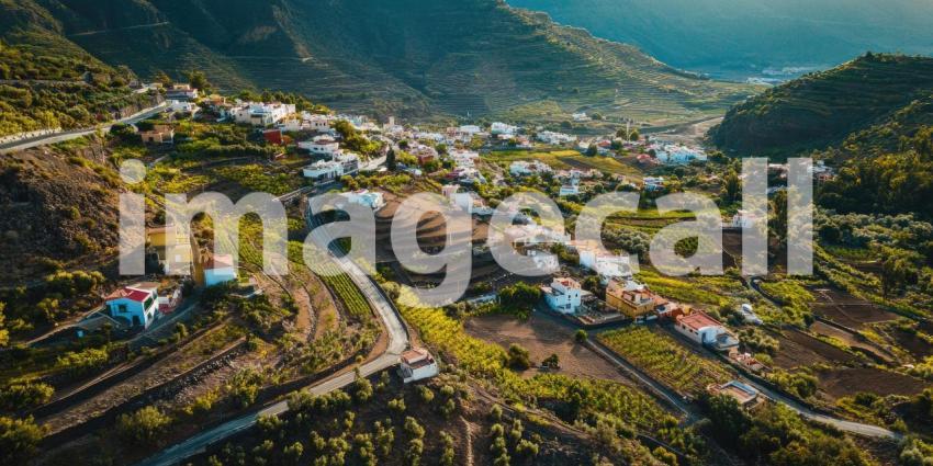 Mountainside Village: A Verdant Oasis Nestled Among Terraced Vineyards and Rugged Cliffs