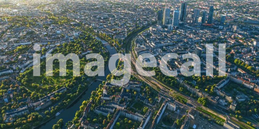 Panoramic Cityscape: River Curves Through Urban Landscape, Sunburst Above, a 360-Degree View of Metropolis and Sky.