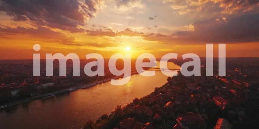 Lake Como Sunset Glow: Pink Skies Reflect on Water, Mountainous Landscape and Winding Shoreline, a Dramatic Aerial View.
