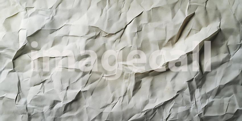 Crinkled White Paper Creates an Abstract Landscape of Texture and Shadow