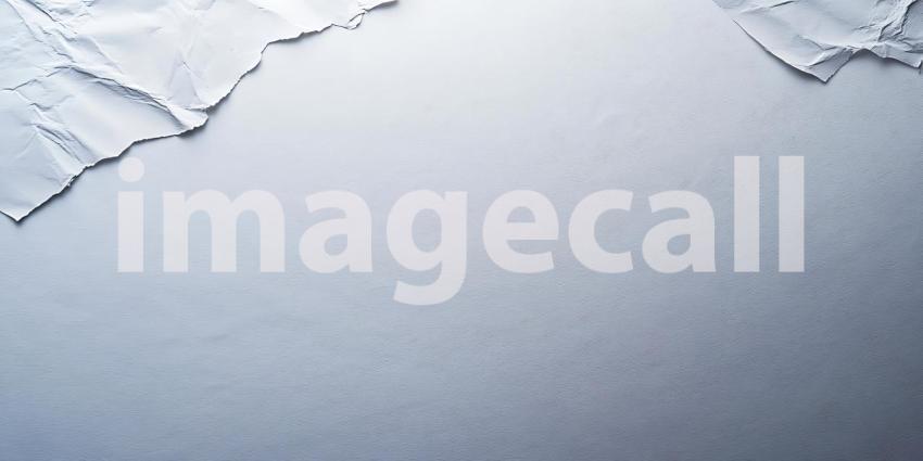 Crinkled White Paper Creates an Abstract Landscape of Texture and Shadow