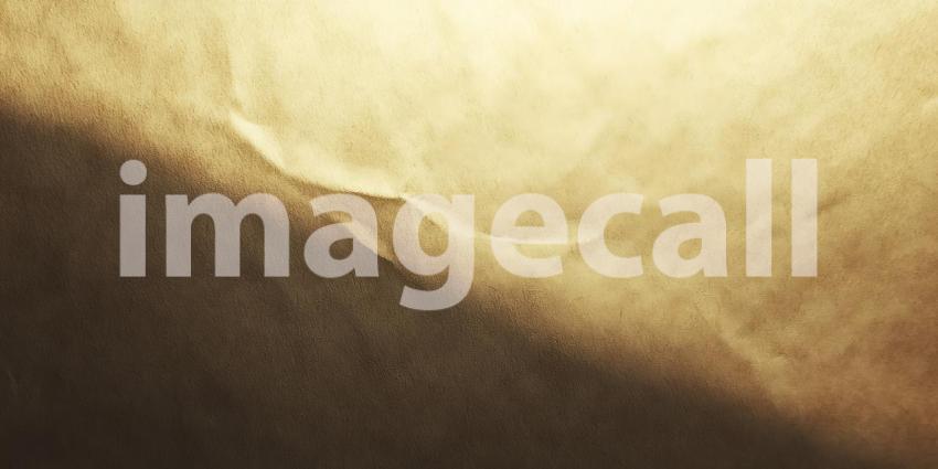 Crinkled White Paper Creates an Abstract Landscape of Texture and Shadow