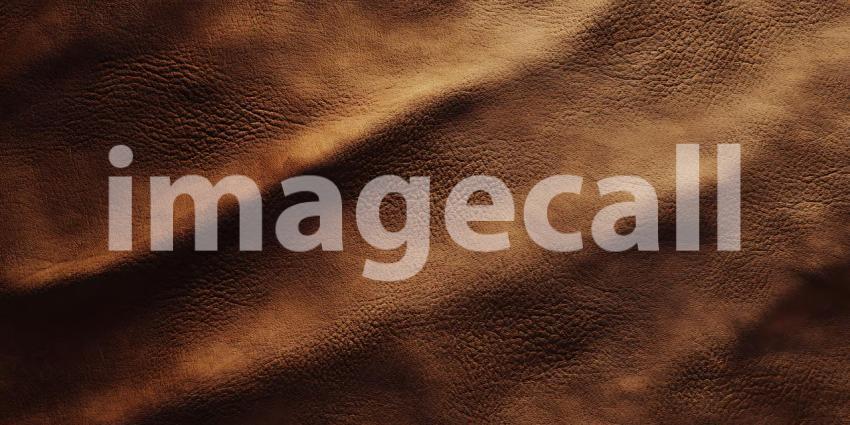 Soft Waves of Rich Brown Fabric Flow Gently Creating a Luxurious and Smooth Texture