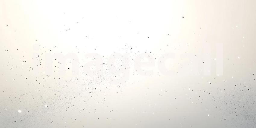Scattered Black Particles Dance Lightly Across a Clean White Surface Creating a Subtle Texture