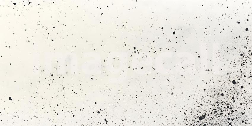 Scattered Black Particles Dance Lightly Across a Clean White Surface Creating a Subtle Texture