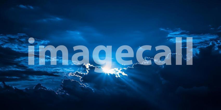 Night Sky Lunar Rays Breaking Through Clouds  Dramatic Celestial