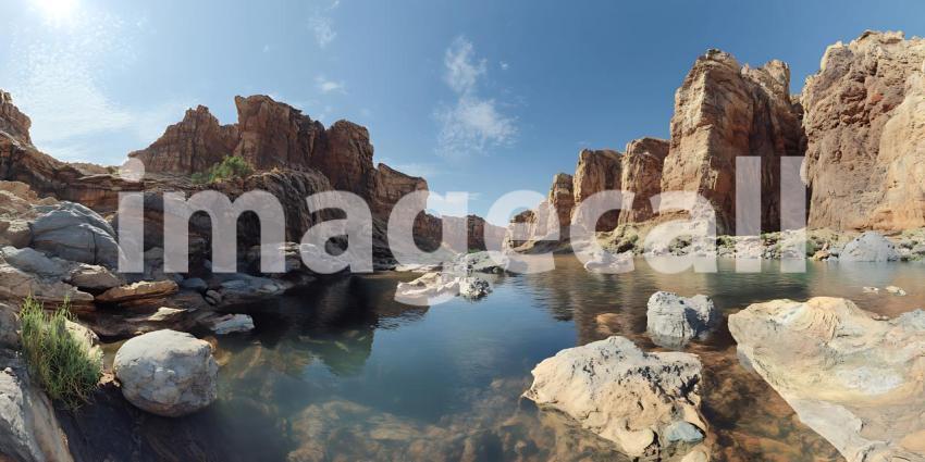 Serene Oasis Rocky Canyon Pool in Desert Landscape