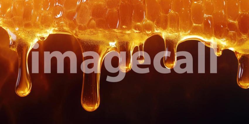 Golden Nectar: A Honey Dipper Dripping with Sweetness, Captured in a Burst of Sunlight