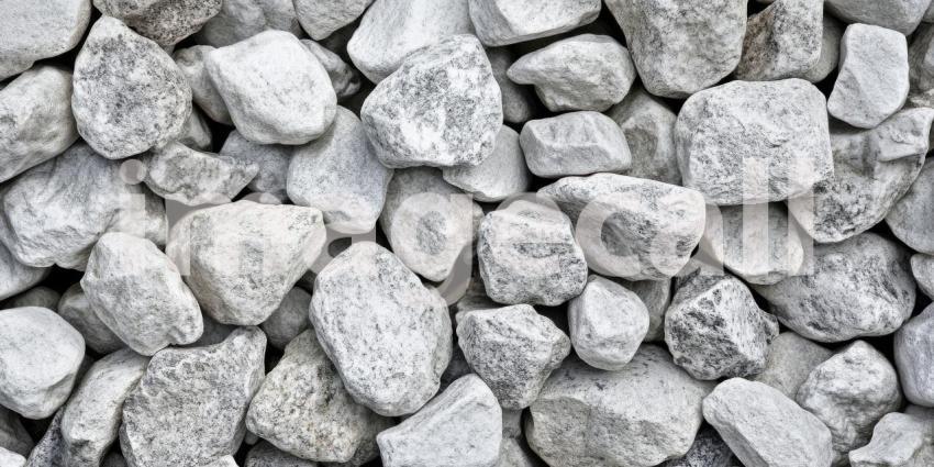 A Tapestry of Stone: A close-up of a bed of smooth, gray pebbles, revealing a mesmerizing interplay of textures and shades
