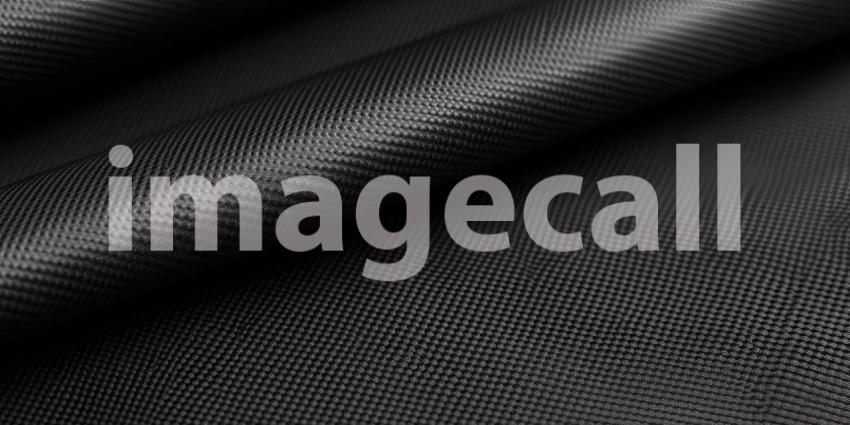 A Tapestry of Texture: A close-up of a dark, textured fabric, with intricate patterns and subtle shadows, evokes a sense of depth and sophistication