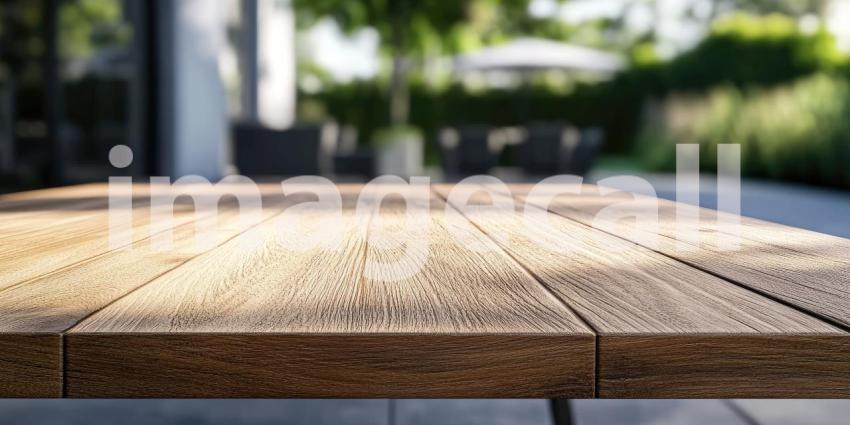 Tranquil Garden View: Wooden Tabletop with Lush Greenery Background