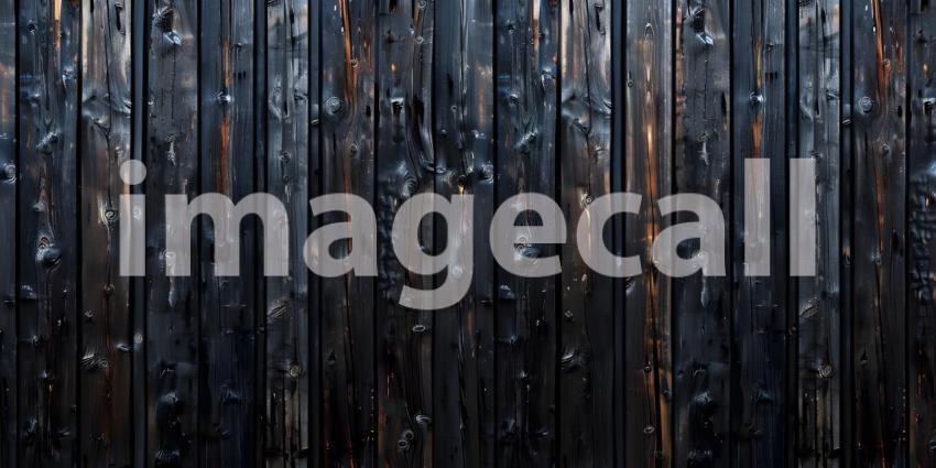 Charred Wood Wall: A Rustic and Textured Background in Shades of Black and Brown