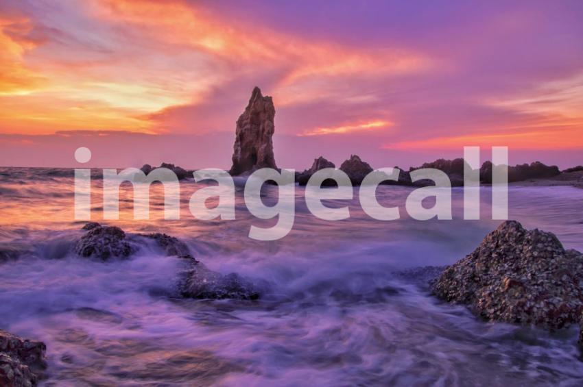 Big stone with long exposure in the dramatic sunset sky t20 2wnkx0
